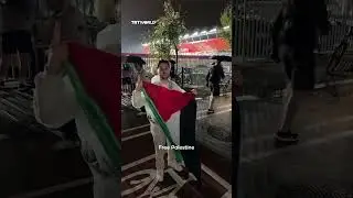Fan with Palestine flag storms Estadi Johan Cruyff during Barcelona game