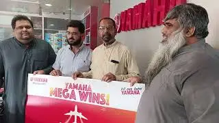 Yamaha Mega prize winner at Mustafa Traders Yamaha Exclusive Dealership in Sialkot,