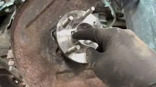 How to replace a Wheel bearing on a 2010 Ford Taurus.