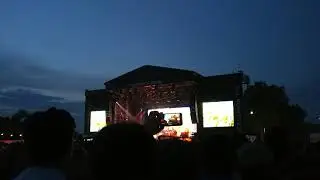 Huge storm in the distance during Bj&ouml;rk performance in Victoria Park, London
