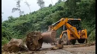 jcb 3dx super removing big boulder (rock) in a landslide area//Jcb vs big rock