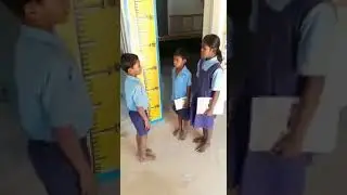 Children without shoes talking in English in India
