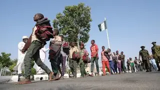 Dozens of Nigerian schoolboys arrive home after being kidnapped