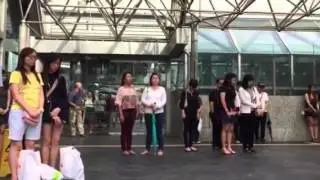 A minute of silence is observed at City Hall MRT station