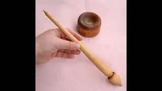 Support spindle with cup