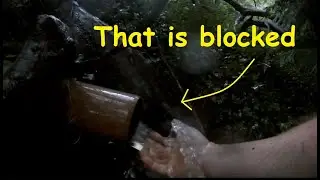 Unblocking culvert pipe in the rain - duck pond overflow 20 10 23
