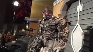 CAUTION:  Don't wear an Optimus Prime helmet-beanie when meeting Megatron at Universal Studios!