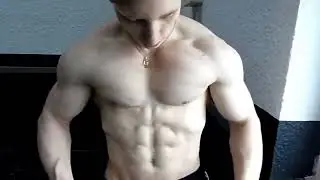 Impressive Student Bodybuilder flexing his incredible muscles.