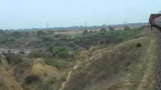INDIAN RAILWAYS Taj Express on S-curve across Sindh River towards Datia.MP4