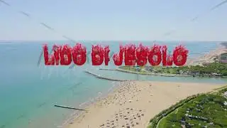 Inscription on video. Italy, Jesolo. Light House Faro di Piave Vecchia. Lido di Jesolo, is the beach