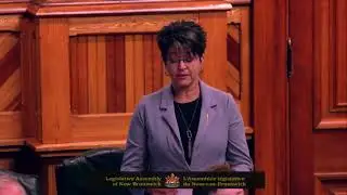 Michelle Conroy presents a petition calling for a sidewalk on Centennial Bridge