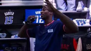 Dwight Howard Works at the Champs Sports Official NBA Shop in Orlando
