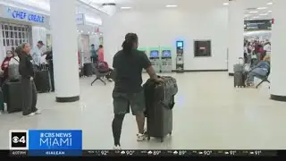 Controversial travel ban now in effect across U.S., as passengers at MIA react | Quickcast