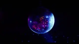 Disco Ball Spinning with Blue and Purple Lights &ndash; Party Vibes 4K Stock Footage
