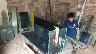 Pembuatan aquarium ukuran 150x50x60 kaca full 12mili  +  beground hitam blakang dan bawah
