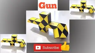 Smiggle snake puzzle or Rubik's twist 24 pieces or Snake Cube - Gun short Gun sten gun