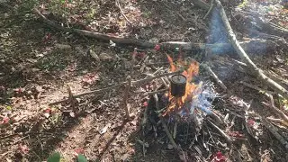 Hanging pot, breakfast. and charring punk wood 