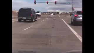 STUPID DRIVER ALERT, CHEYENNE, WYOMING: BLATANTLY RUNNING A RED LIGHT!