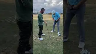 Use the belt buckle to create backswing turn