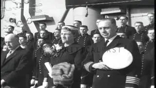 Captain R. J. Stroh speaks into a microphone at the commissioning ceremony of USS...HD Stock Footage