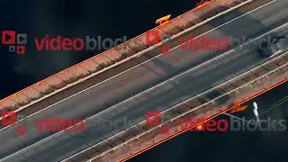 Aerial view of bridge crossing remote canal
