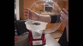 Using a Nostalgia Cotton Candy Machine.
