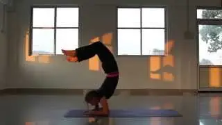 Scorpion from headstand