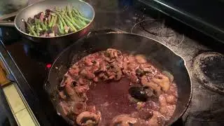 Venison medallions with caramelized onions and Cabernet Sauvignon mushroom pan sauce.