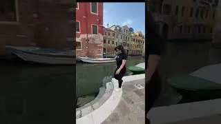 Woman Slips and Falls Into Canal While Shooting Video - 1503165