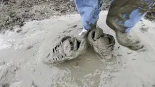 Full mud adventure of Globe Sabre sneakers with white socks while sagging baggy Buttergoods jeans