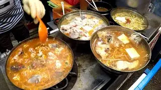 Seoul Street Food, Korea. Fish Soup, 'Hotteok' and 'Susubukkumi' Pancakes. Gwangjang Food Market
