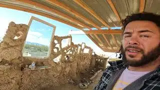 building an off-grid earth ship update. Pizza oven and glass install
