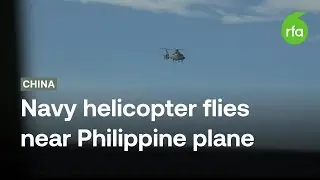 Chinese navy helicopter flies close to Philippine patrol plane over disputed shoal