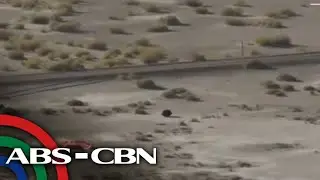 WATCH: NASA's first asteroid sample parachutes into Utah desert | ABS-CBN News