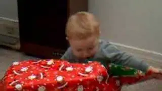 Justin Opening an Early Present