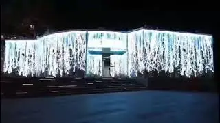 Very Cool Waterfall Effect On Transparent Video Screen Installed On Glass Facade