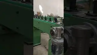 CONVEYOR FOR PLATE STACKING MACHINE