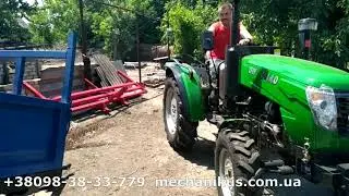 Трактор DW 404 AD с прицепом и сеялкой