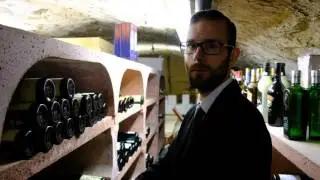 Bernard presents the wine cellar of restaurant La Distillerie