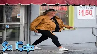 Cat Deeley, 41, draws attention to her baby bump in a yellow raincoat
