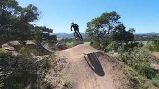 Stromlo mountain biking 'Hillfire green' jump trail drone follow cam Stromlo MTB