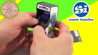 Самая маленькая в мире игровая приставка Galaxian Tiny Arcade Game
