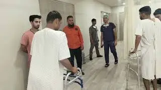Hip Replacement patients walking together