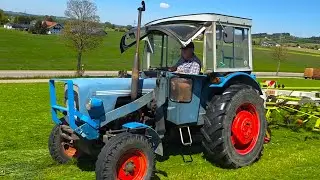 Eicher Mammut 74 mit 10 Meter Claas Kreiselheuer beim Gras wenden im Allg&auml;u