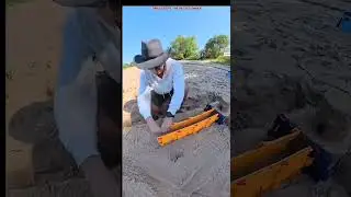 The old grandfather built a sandcastle