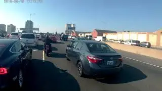 Lane splitting in heavy traffic