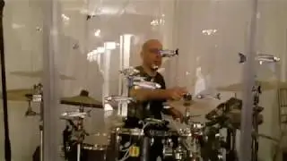 Drummer behind Sound Shield