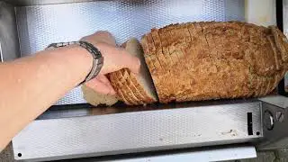 auktion.umrath-com  - Brotschneidemaschine Pegasus SB Testlauf