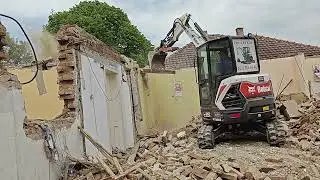Bobcat E35z demolishing a house