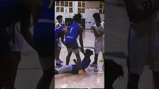 Mikey Williams standing up for teammate